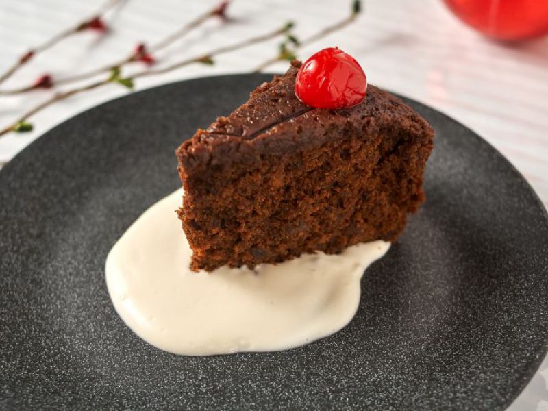 Christmas Pudding with Rum Butter Sauce 